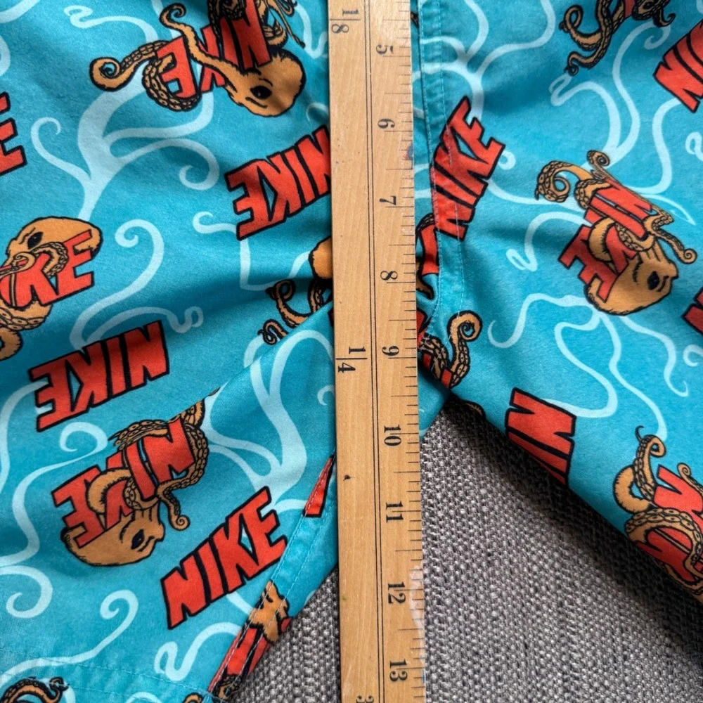 Nike Boys Swim Trunks Teal Octopus Print Mesh Lined Shorts Size S 128-137cm